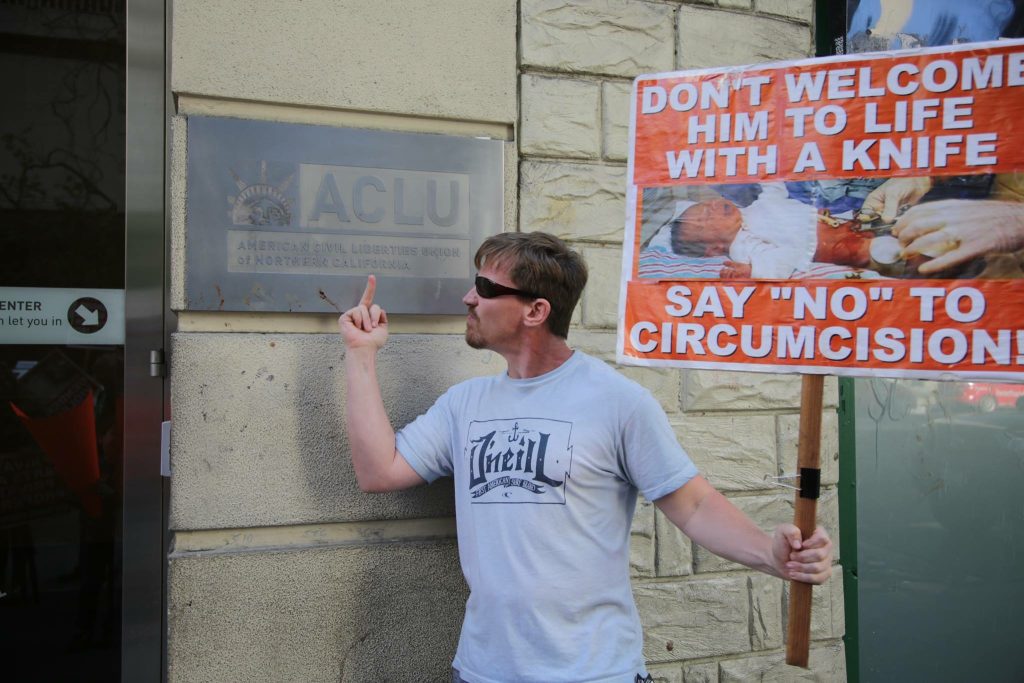 https://www.nextlevelintactivism.com/wp-content/uploads/2023/06/Protest-Pics-END-Circumcision-Fuck-You-ACLU-1024x683.jpg